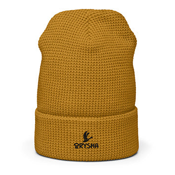 Mustard yellow knit beanie with a brand logo on a white background