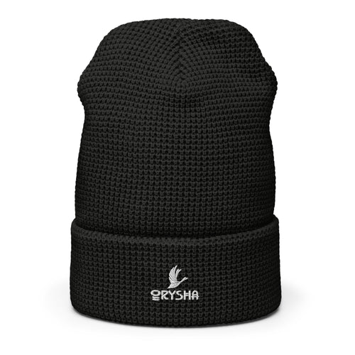 Black knit beanie with a brand logo on a white background