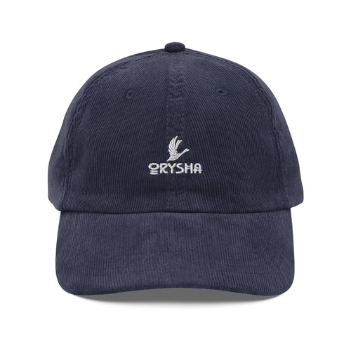 Orysha Essential Logo Vintage Corduroy Hat in brown featuring premium embroidered logo, soft cotton corduroy fabric, and adjustable gold-tone buckle closure.