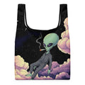 Orysha Higher Vibes tote bag featuring a relaxed alien smoking in pastel clouds against a starry sky