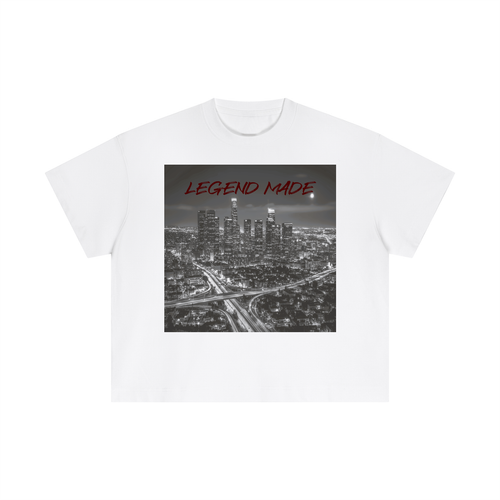 White t-shirt with a graphic of a cityscape and 'LEGEND MADE' text on a white background