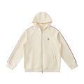Beige hoodie with red stripes on sleeves on a white background
