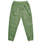 unisex sage green water-resistant track pants with relaxed fit and mesh lining