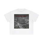 White t-shirt with a graphic of a cityscape and 'LEGEND MADE' text on a white background
