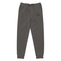 Orysha unisex pigment-dyed sweatpants in washed black, relaxed fit with drawstring waist and ribbed cuffs — vintage-style streetwear joggers.