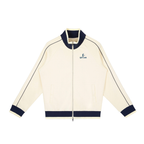 Cream-colored jacket with navy accents on a white background