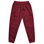 Women’s burgundy water-resistant track pants with relaxed fit and mesh lining