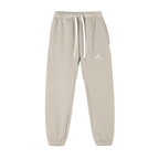 Beige sweatpants with a brand logo on a white background