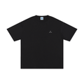 Black t-shirt with a small logo on a white background