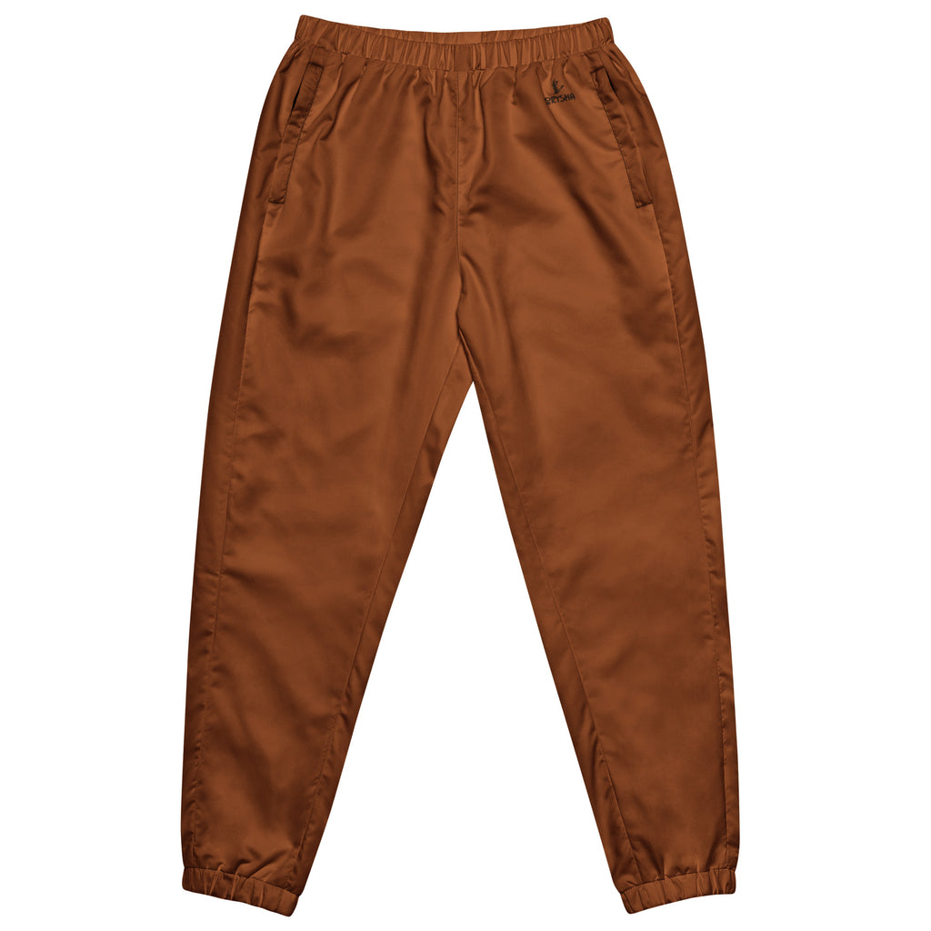 Women’s saddle brown water-resistant track pants with relaxed fit and mesh lining