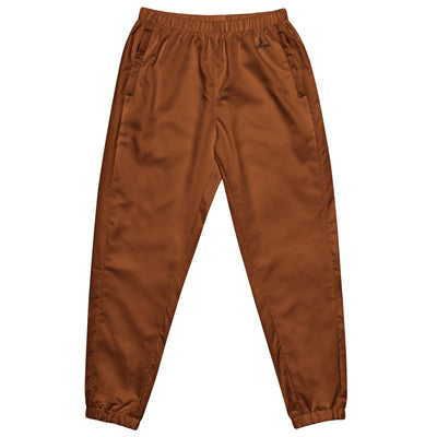 Women’s saddle brown water-resistant track pants with relaxed fit and mesh lining