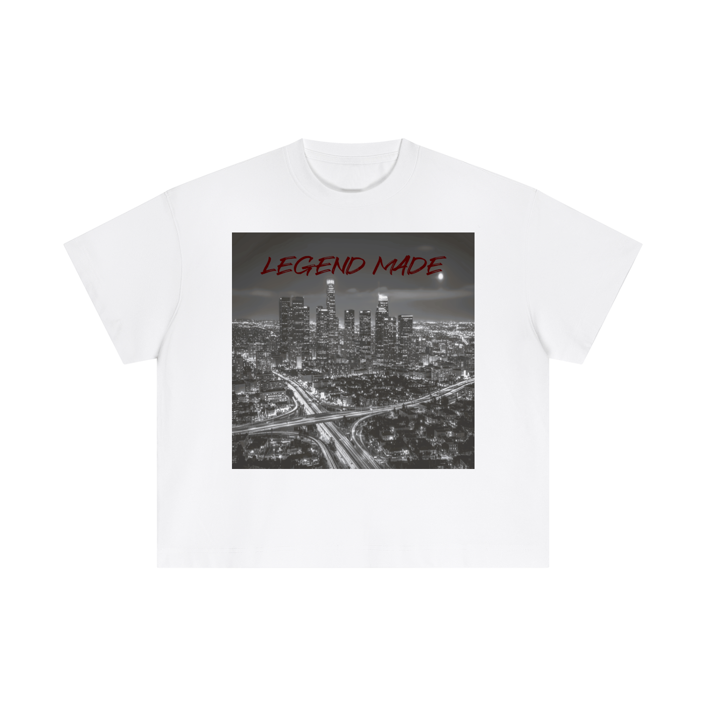 White t-shirt with a graphic of a cityscape and 'LEGEND MADE' text on a white background